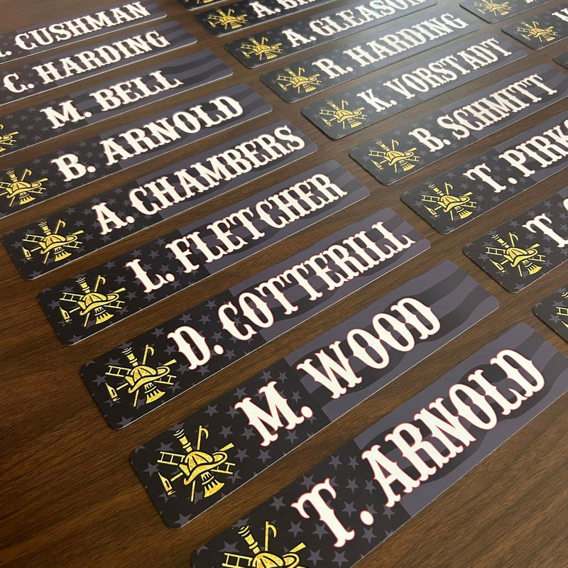Fire department locker name plate with Maltese cross